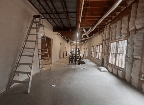 basement exposed ceiling painting during