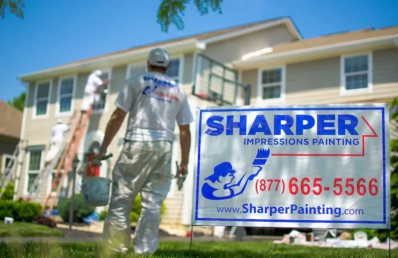 painters-front-yard-with-sign.jpg.webp
