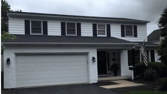 white-siding-dark-trim.png.webp