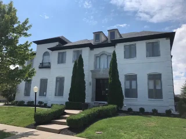 white-siding-paint-black-trim-exterior-after.jpg.webp